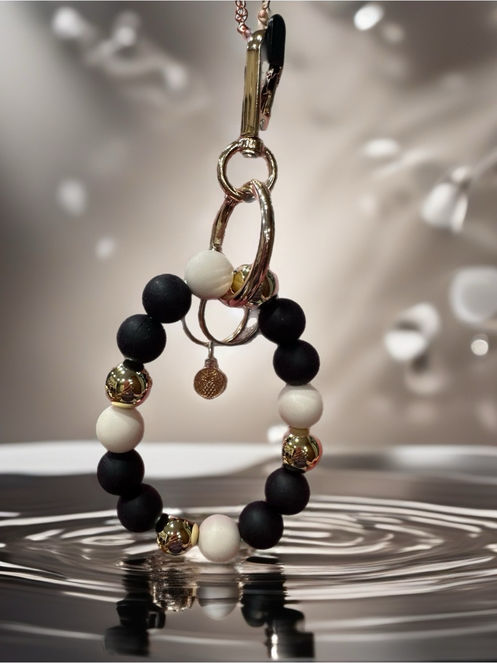 Black & White Beaded Keychain with Gold Accents